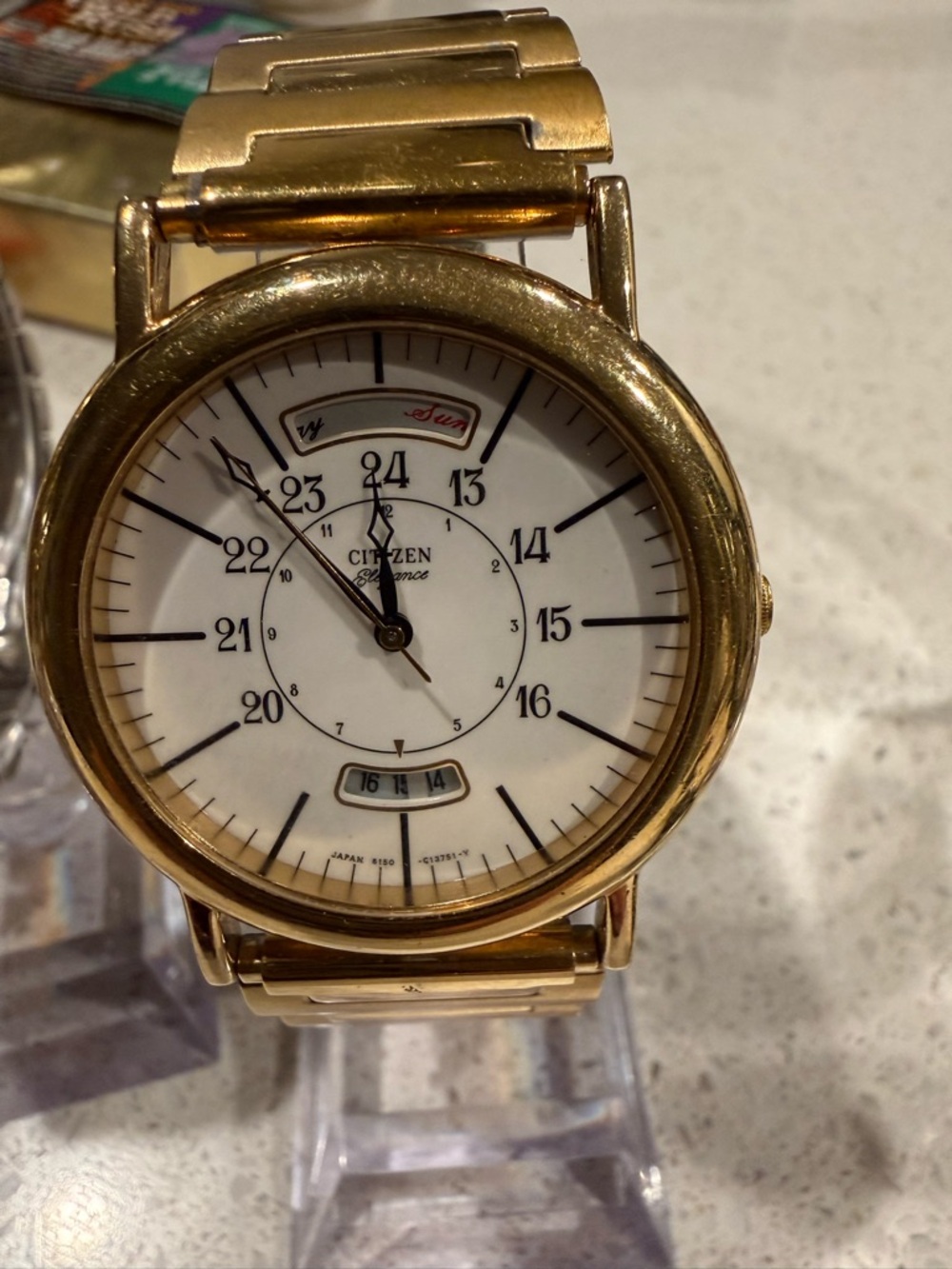 Citizen Gold Tone Watch with White Dial and Day-Date